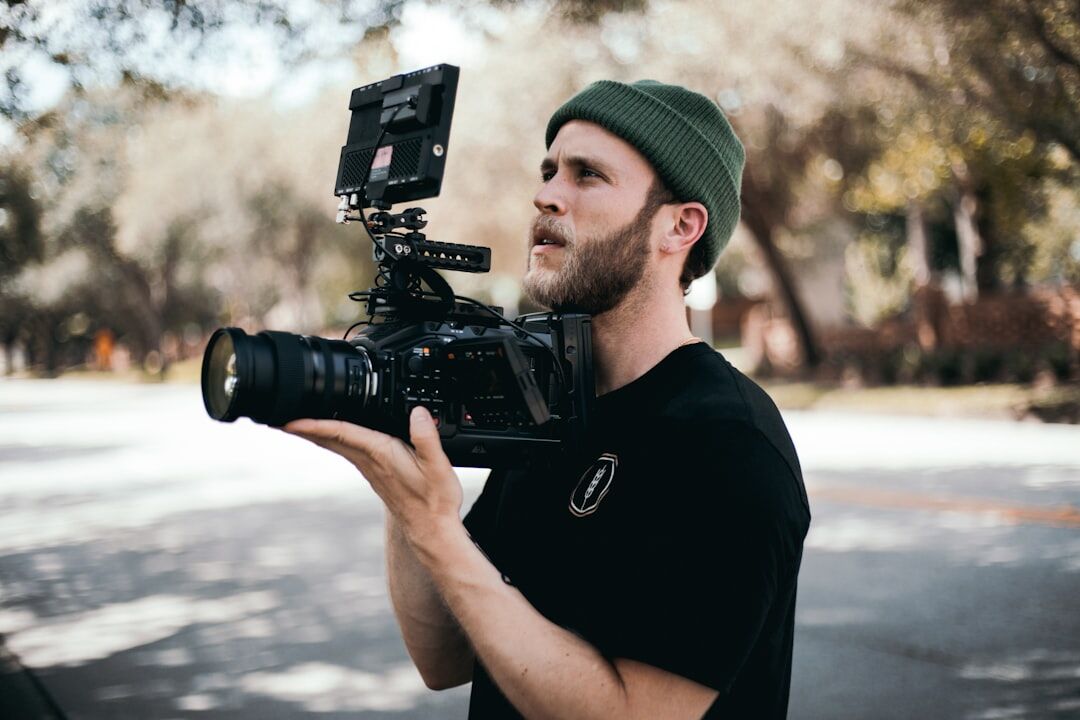 professional filmmaker with camera